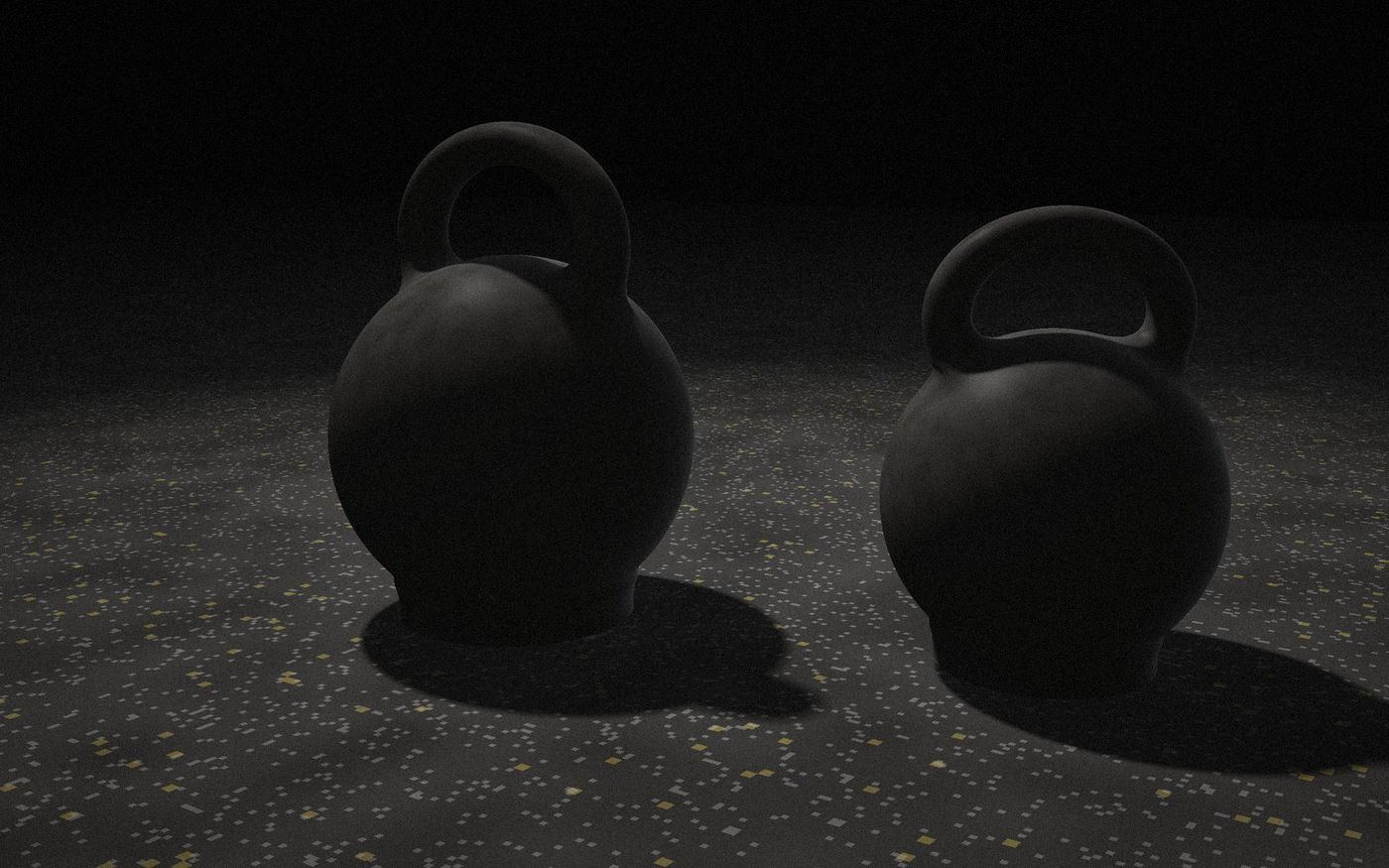 Dois kettlebells sob luz lateral